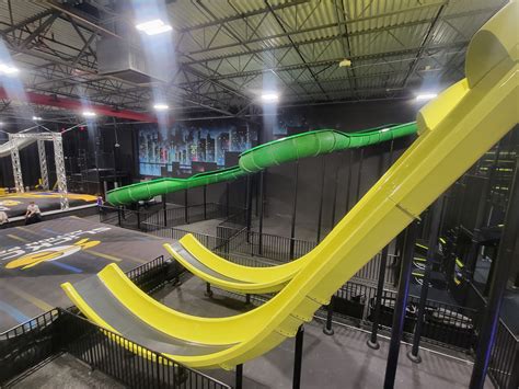 Slick city action park - New Chesterfield indoor slide park to open soon. Slick City Action Park is an all-ages indoor action park and party venue that has slides and air courts. They are the first indoor slide park without any water. Patrons ride on mats down slides of all sizes. They also have a basketball court, a climbing area for kids, and an arcade.